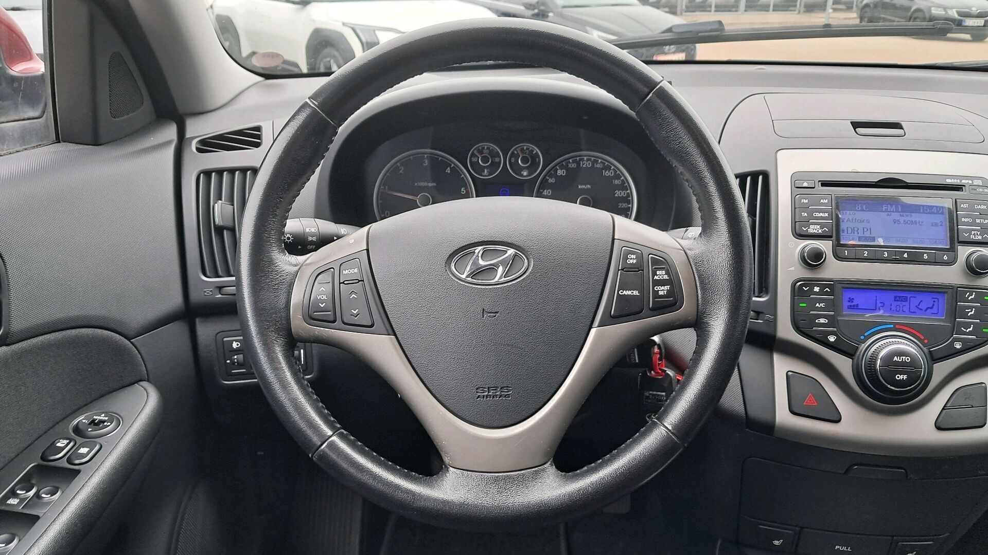 Rød Hyundai i30 fra 2009