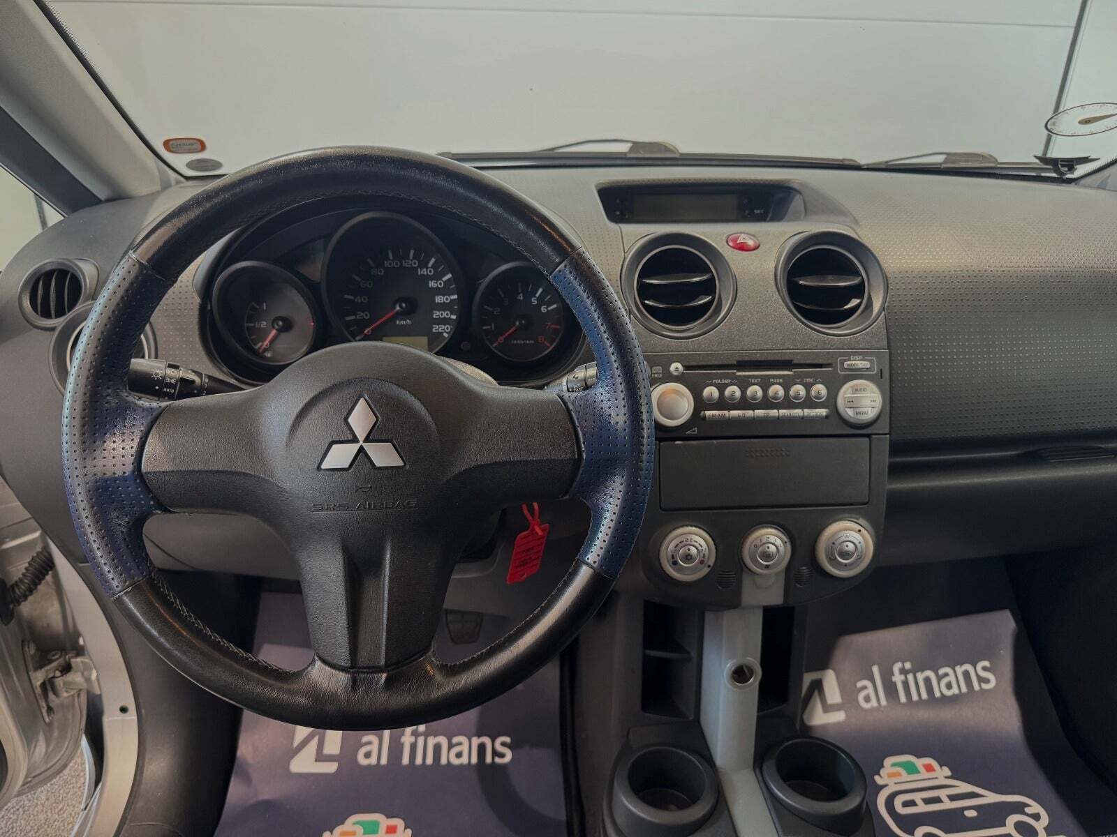 Sølv Mitsubishi Colt fra 2007