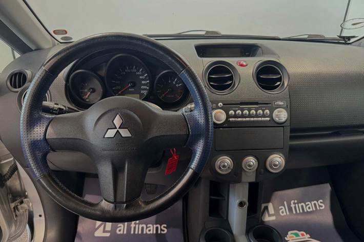 Sølv Mitsubishi Colt fra 2007