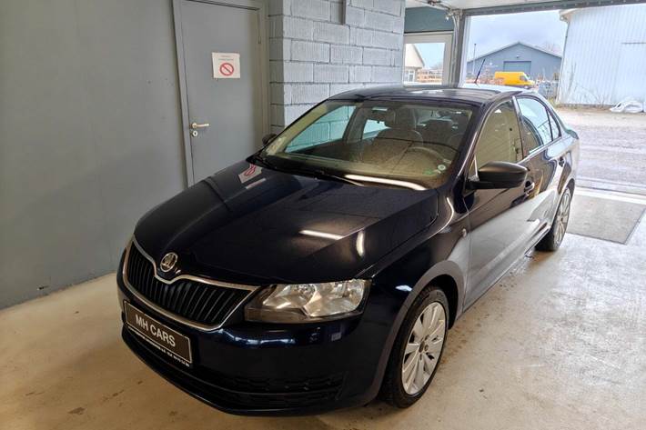 Gul Skoda Rapid fra 2014