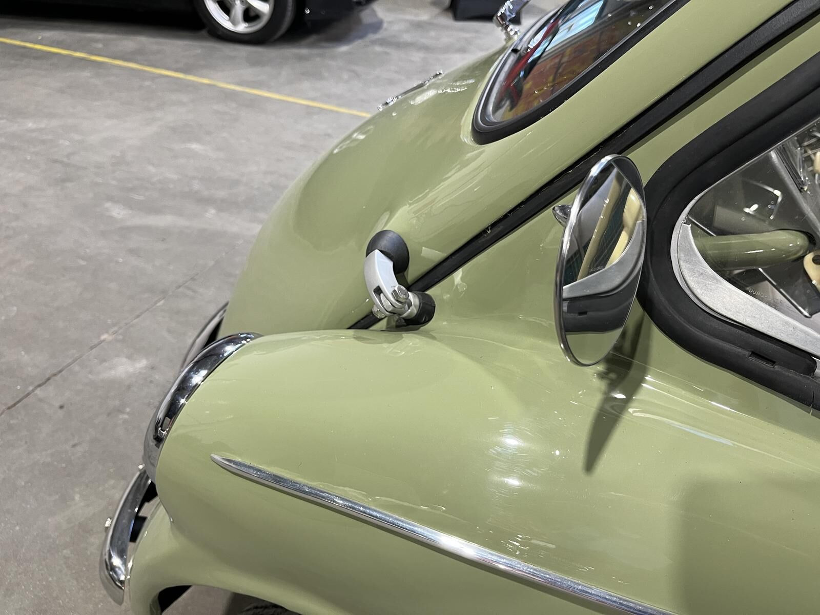 Grøn Heinkel 150 fra 1956 set udefra