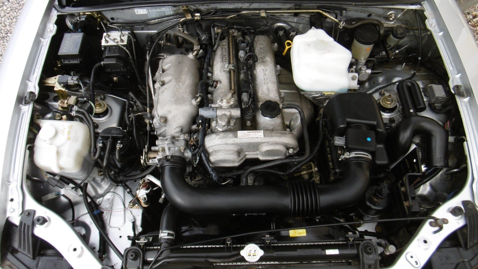 Sølv Mazda MX-5 fra 2005