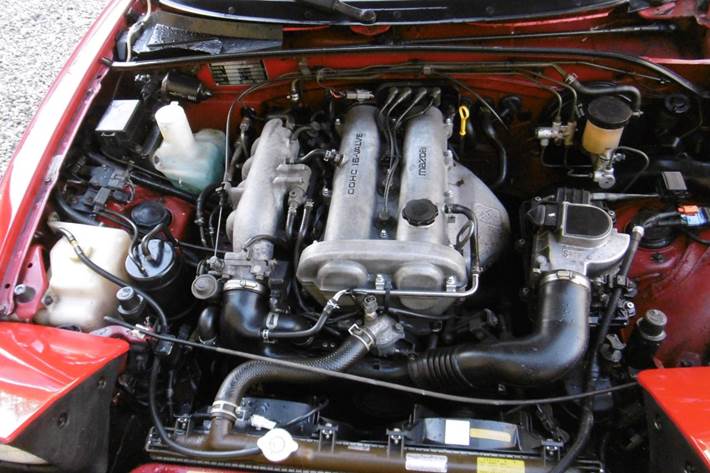 Rød Mazda MX-5 fra 1990