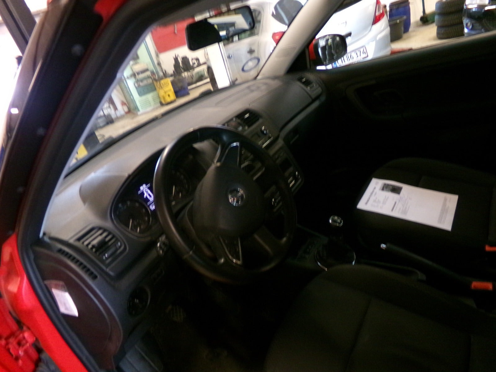 Rød Skoda Fabia fra 2013