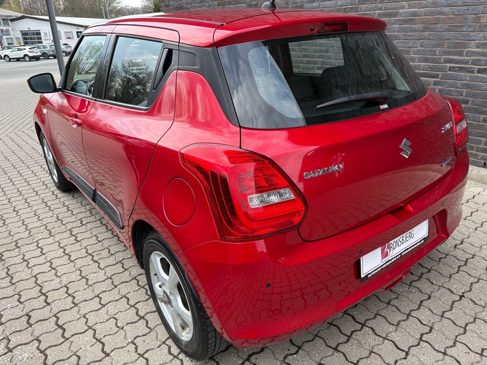 Rød Suzuki Swift fra 2021