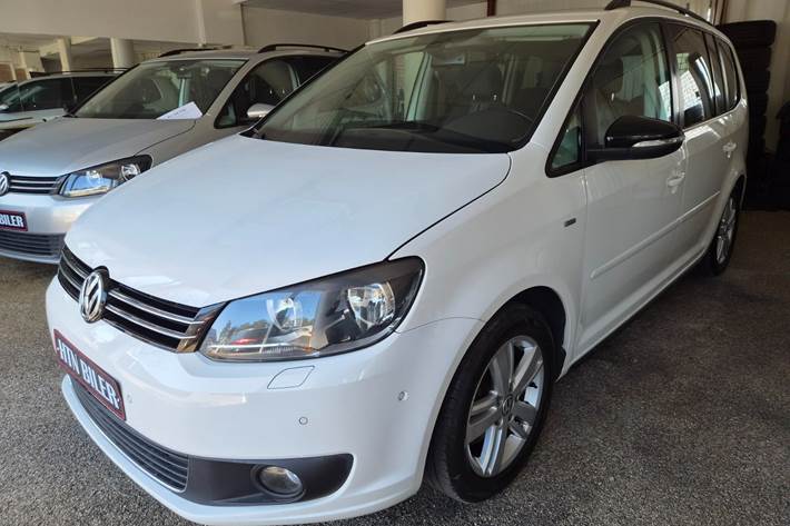 Hvid VW Touran fra 2013