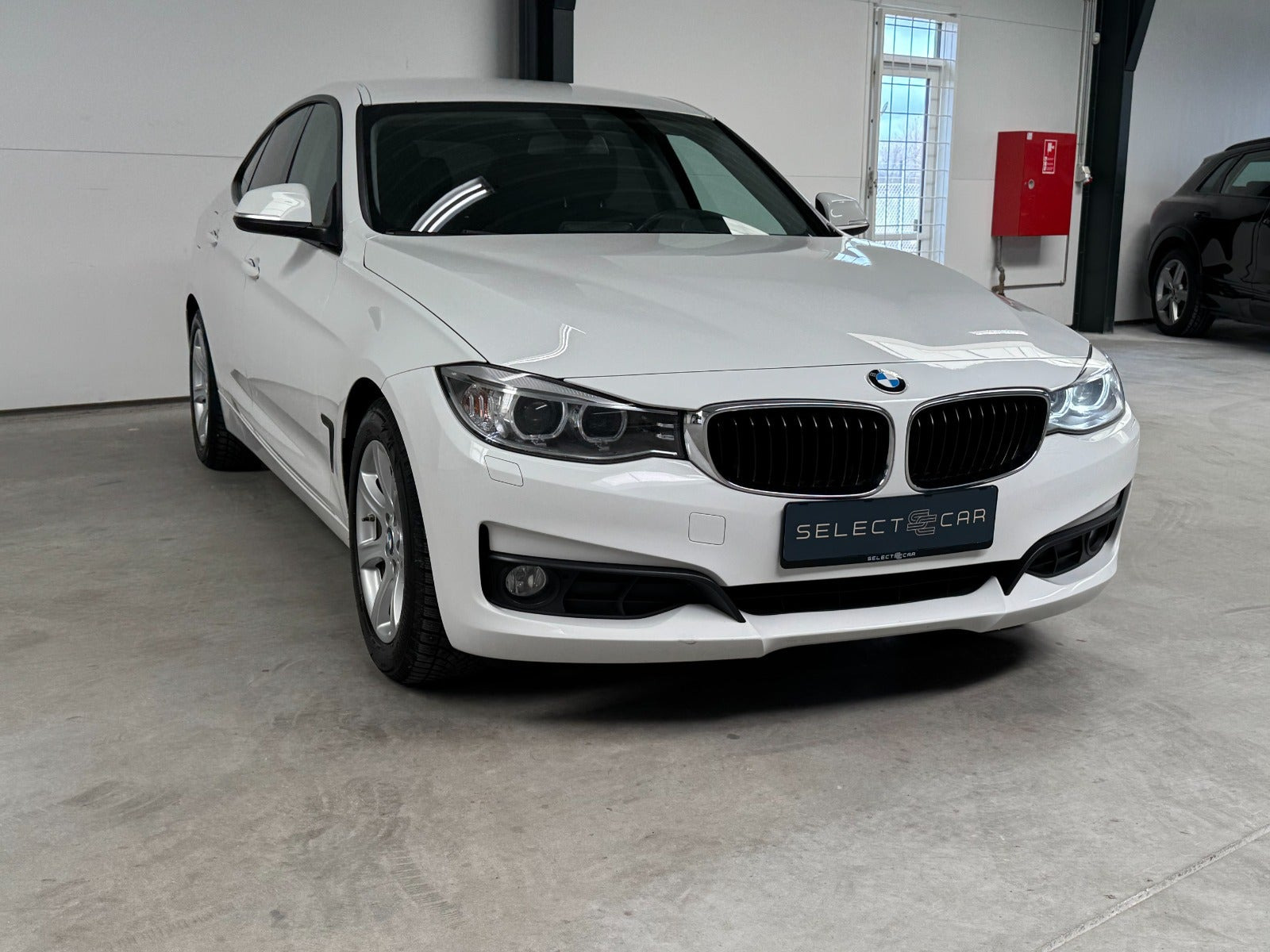 Hvid BMW 320d fra 2014