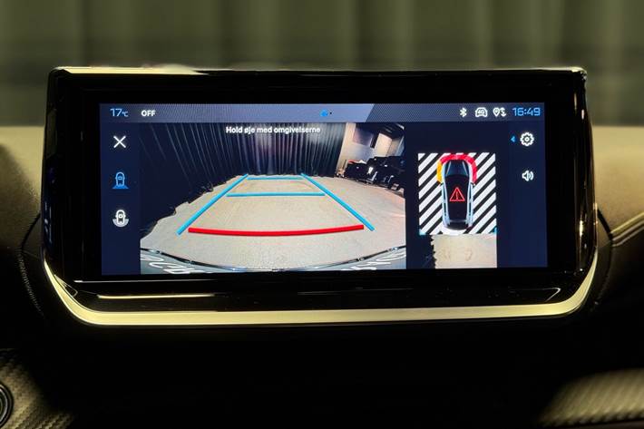 Grå Peugeot e-208 fra 2025