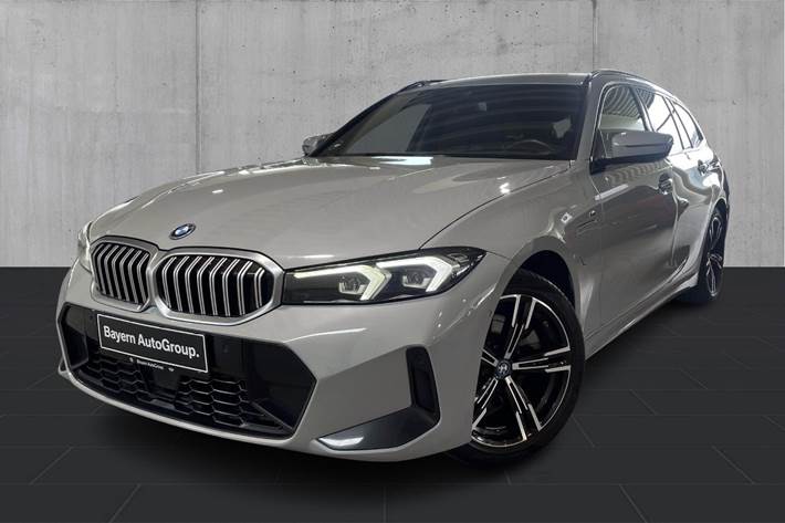 Sølv BMW 320e fra 2023