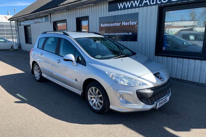 Sølv Peugeot 308 fra 2011