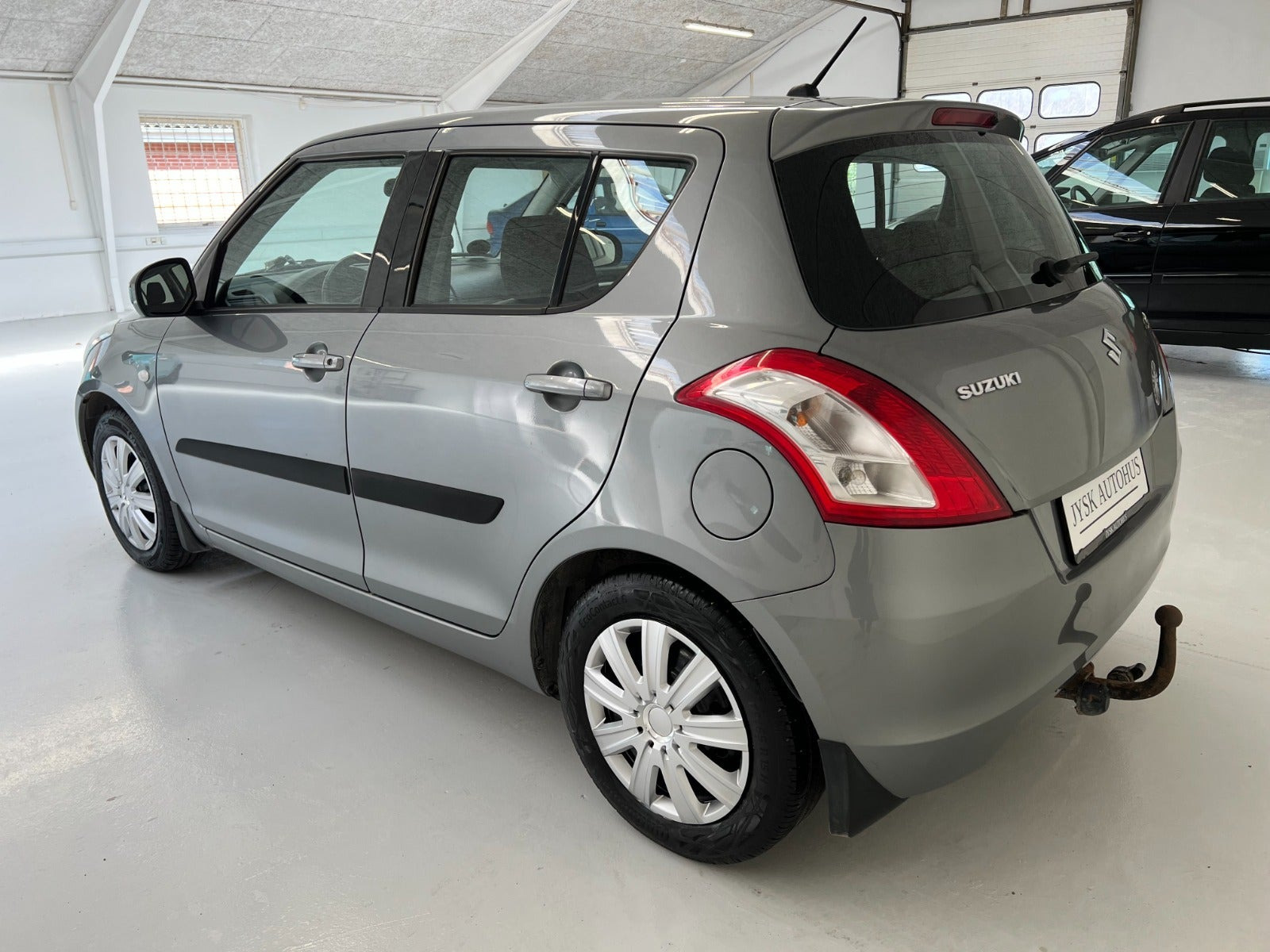 Grå Suzuki Swift fra 2012