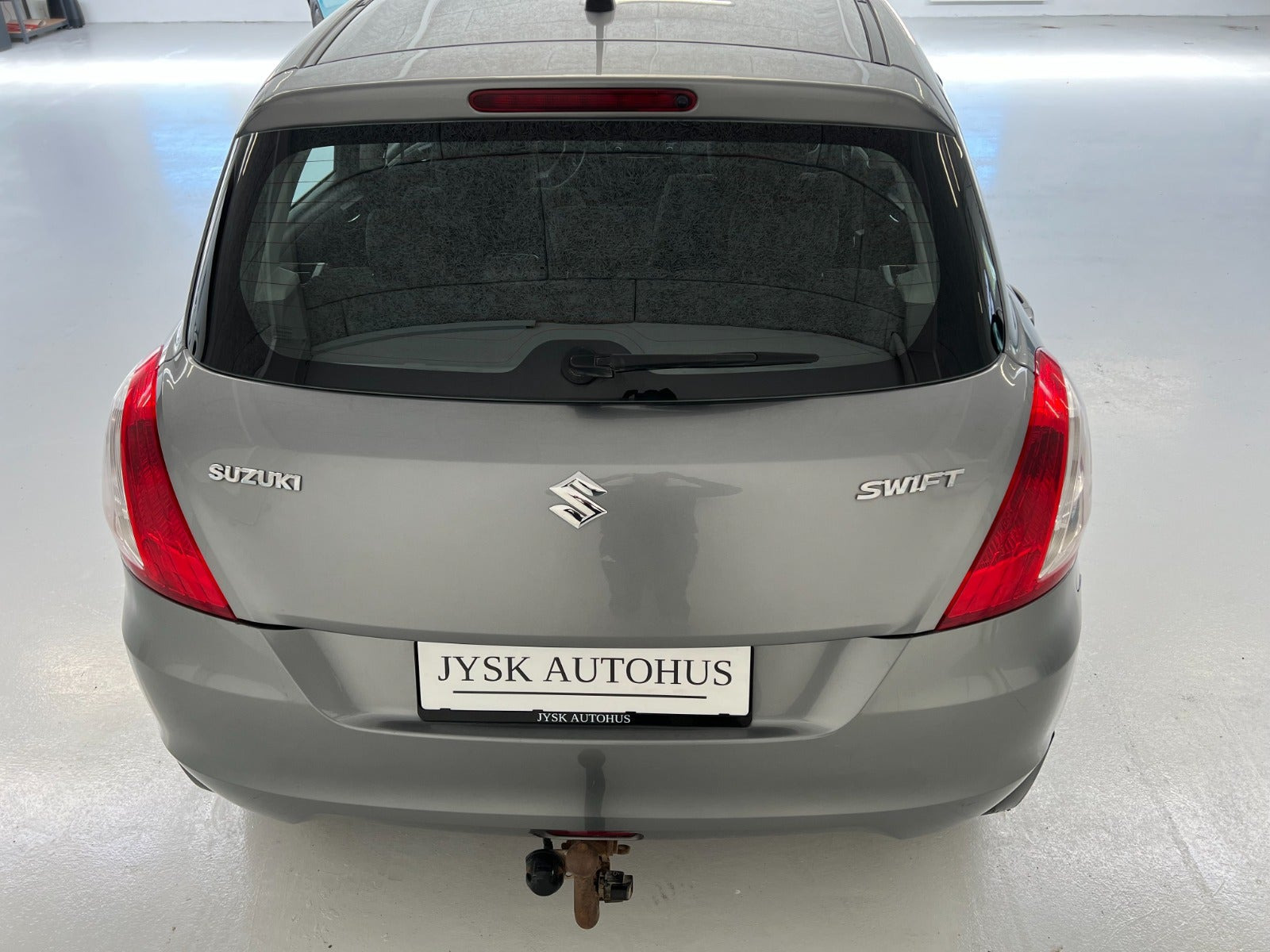 Grå Suzuki Swift fra 2012