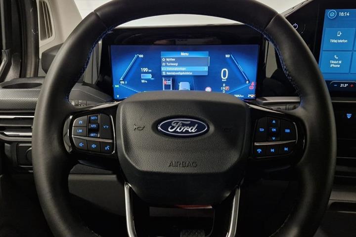 Grå Ford E-Transit Custom 320 L1 fra 2025 set indefra