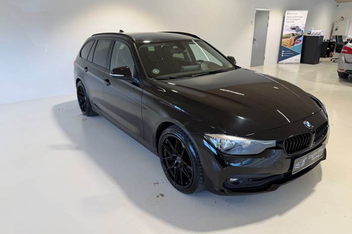Sort BMW 320d fra 2017
