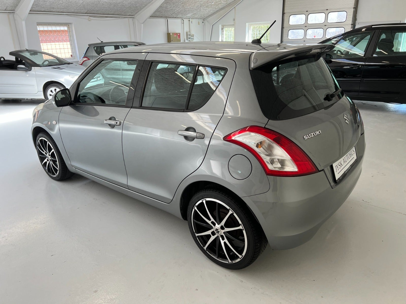 Grå Suzuki Swift fra 2012