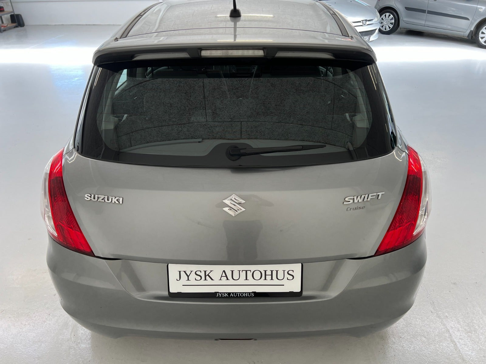 Grå Suzuki Swift fra 2012