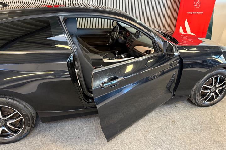 Sort BMW 118d fra 2015