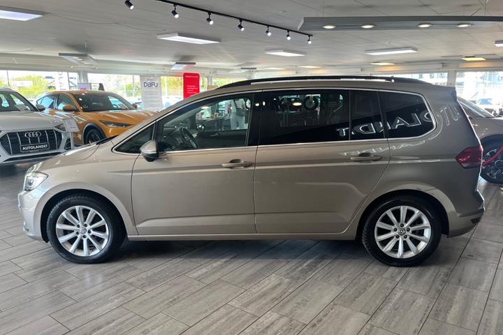Orange VW Touran fra 2018