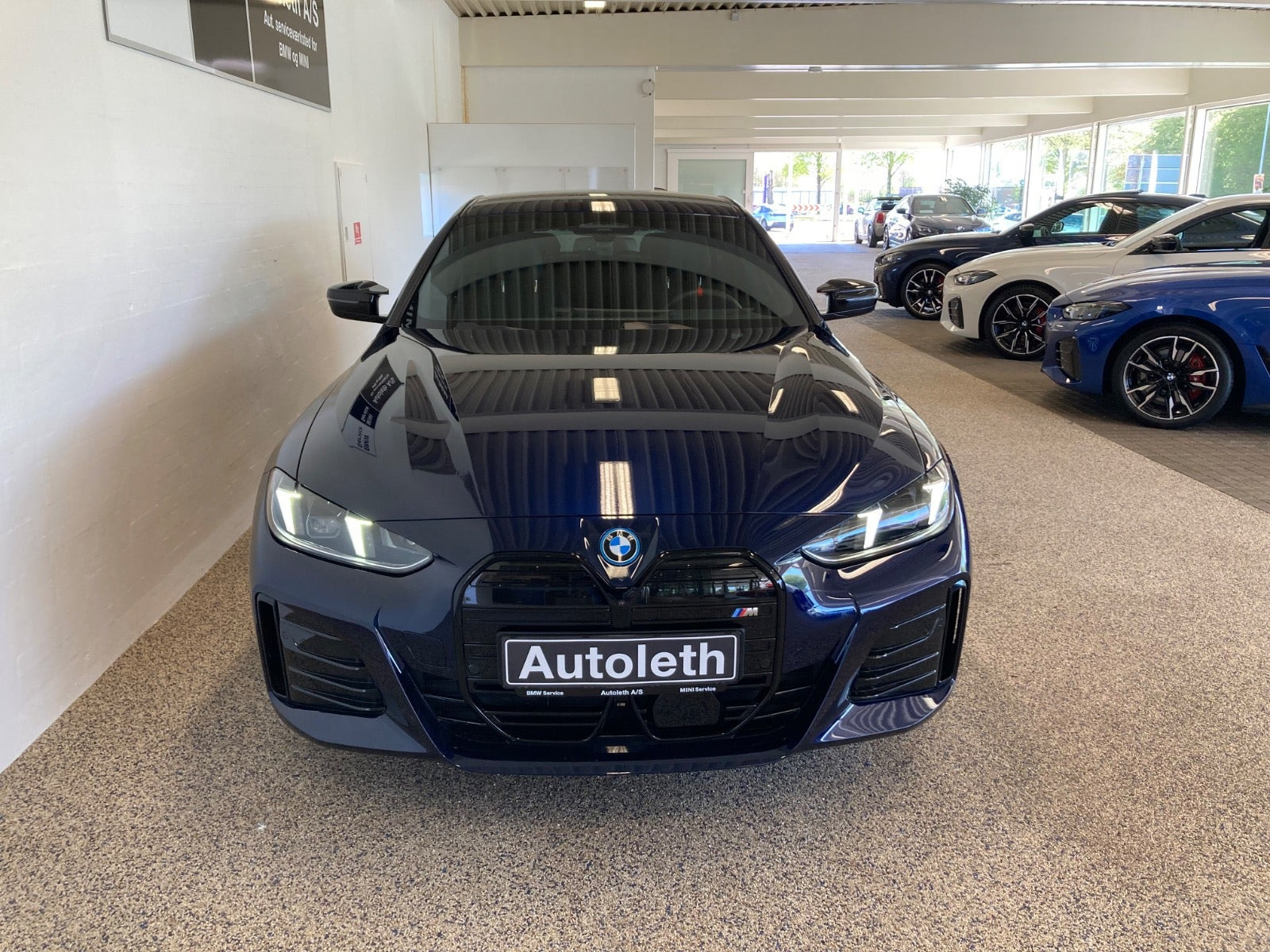Blå BMW i4 fra 2025