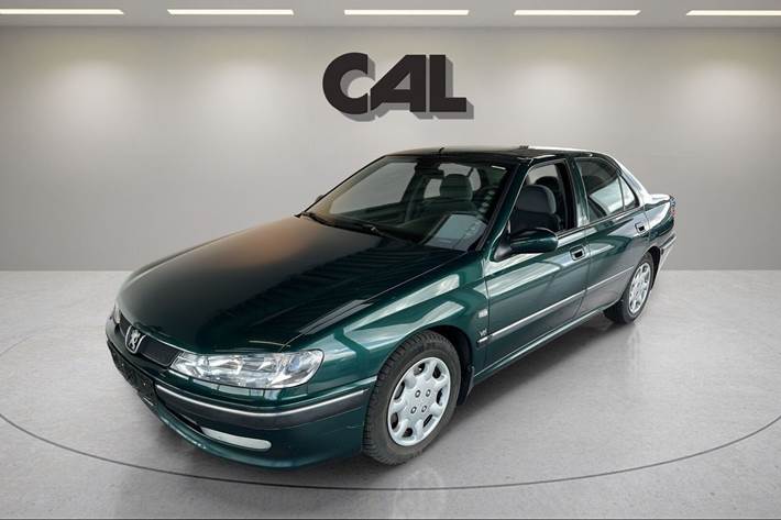 Grøn Peugeot 406 fra 1999