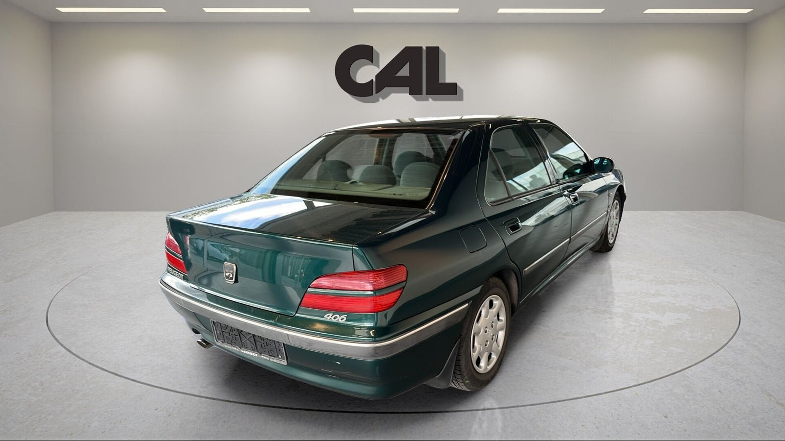 Grøn Peugeot 406 fra 1999 set udefra