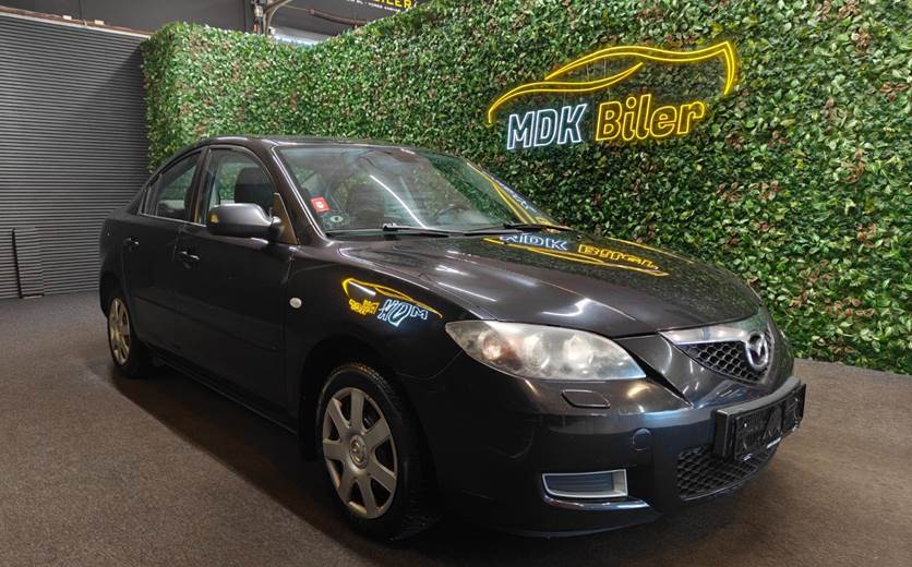 Mazda 3 1,6 Touring