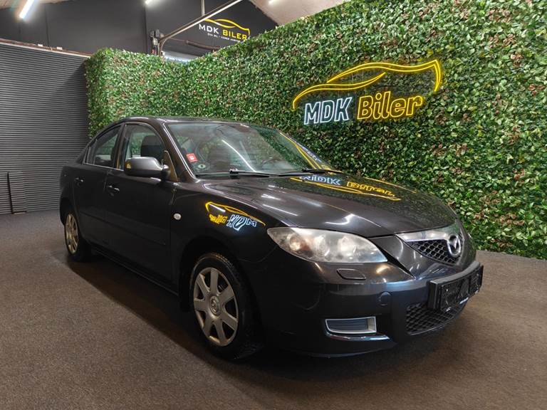 Mazda 3 1,6 Touring