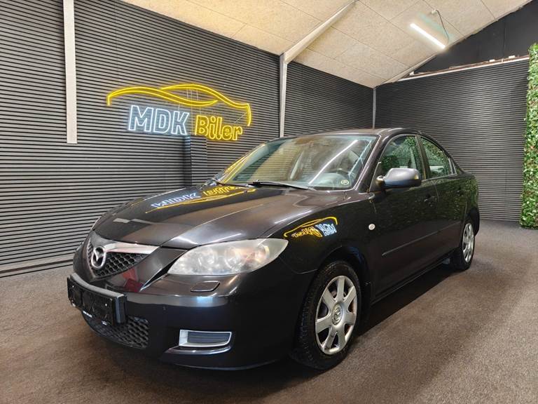 Mazda 3 1,6 Touring
