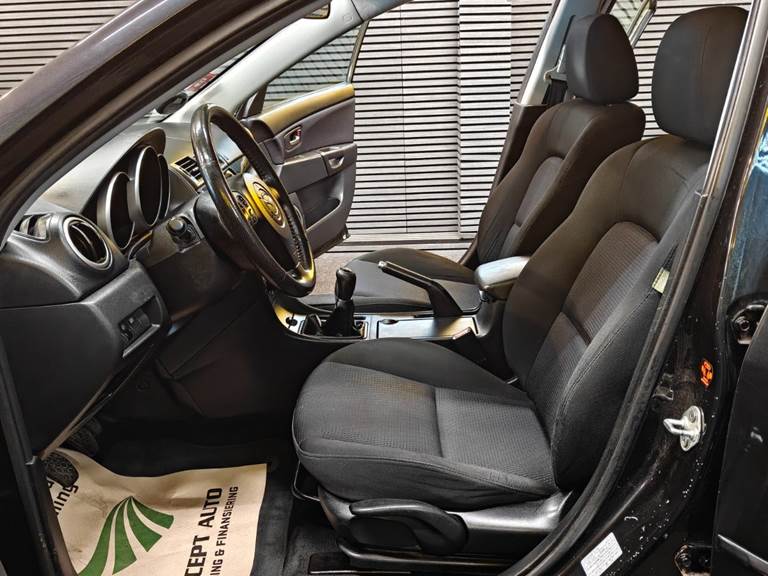 Mazda 3 1,6 Touring