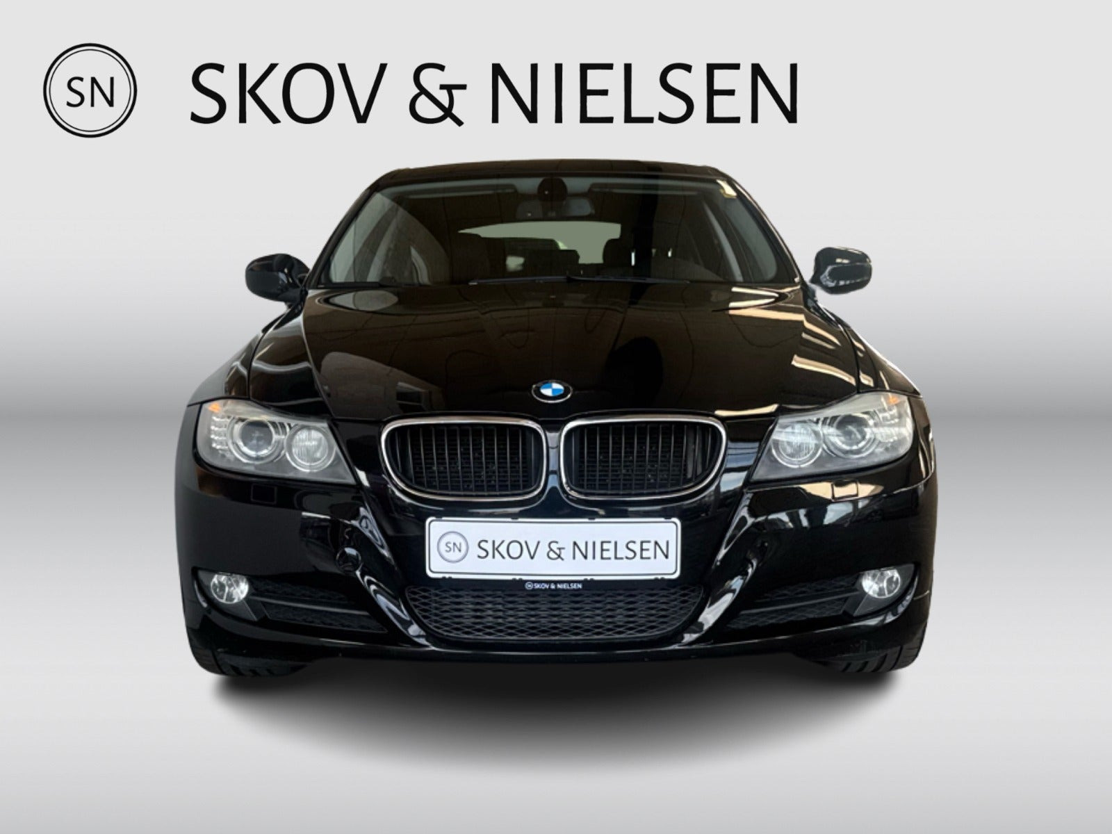 Sort BMW 318d fra 2009