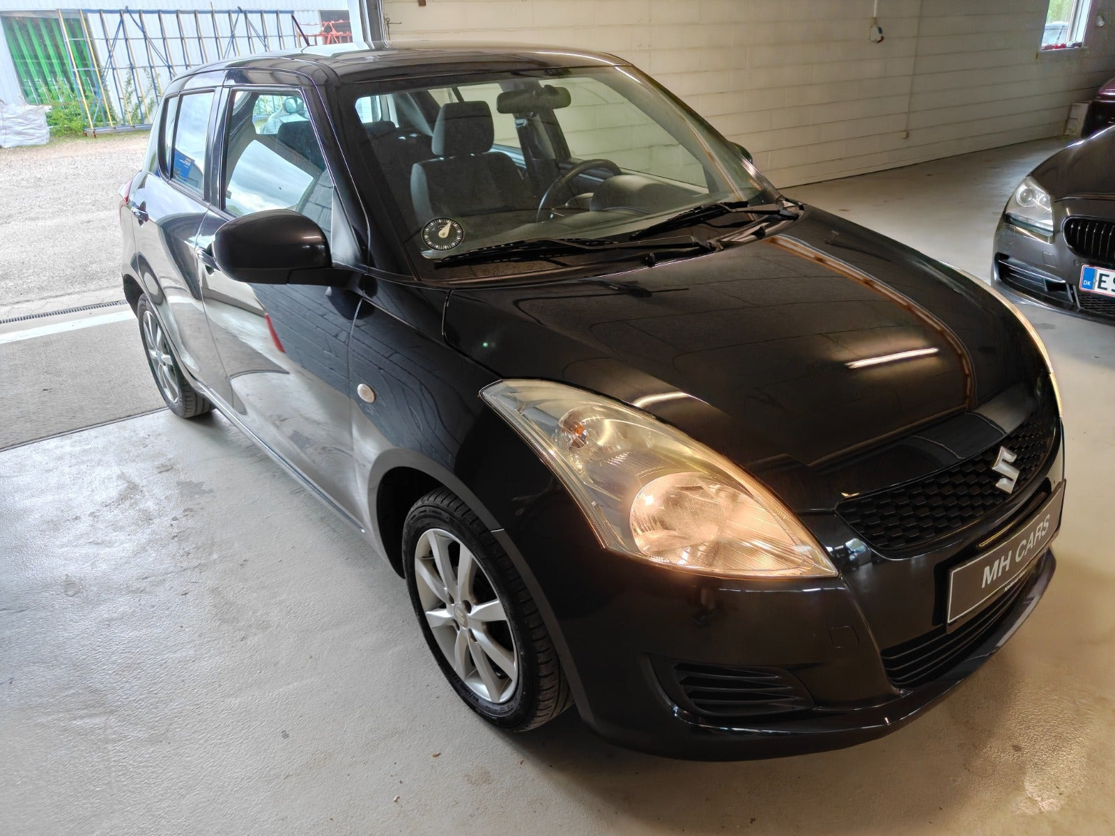Gul Suzuki Swift fra 2011