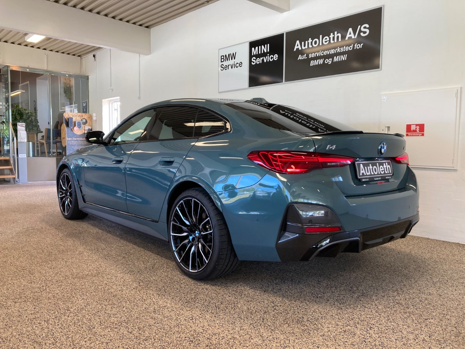 Grøn BMW i4 fra 2025