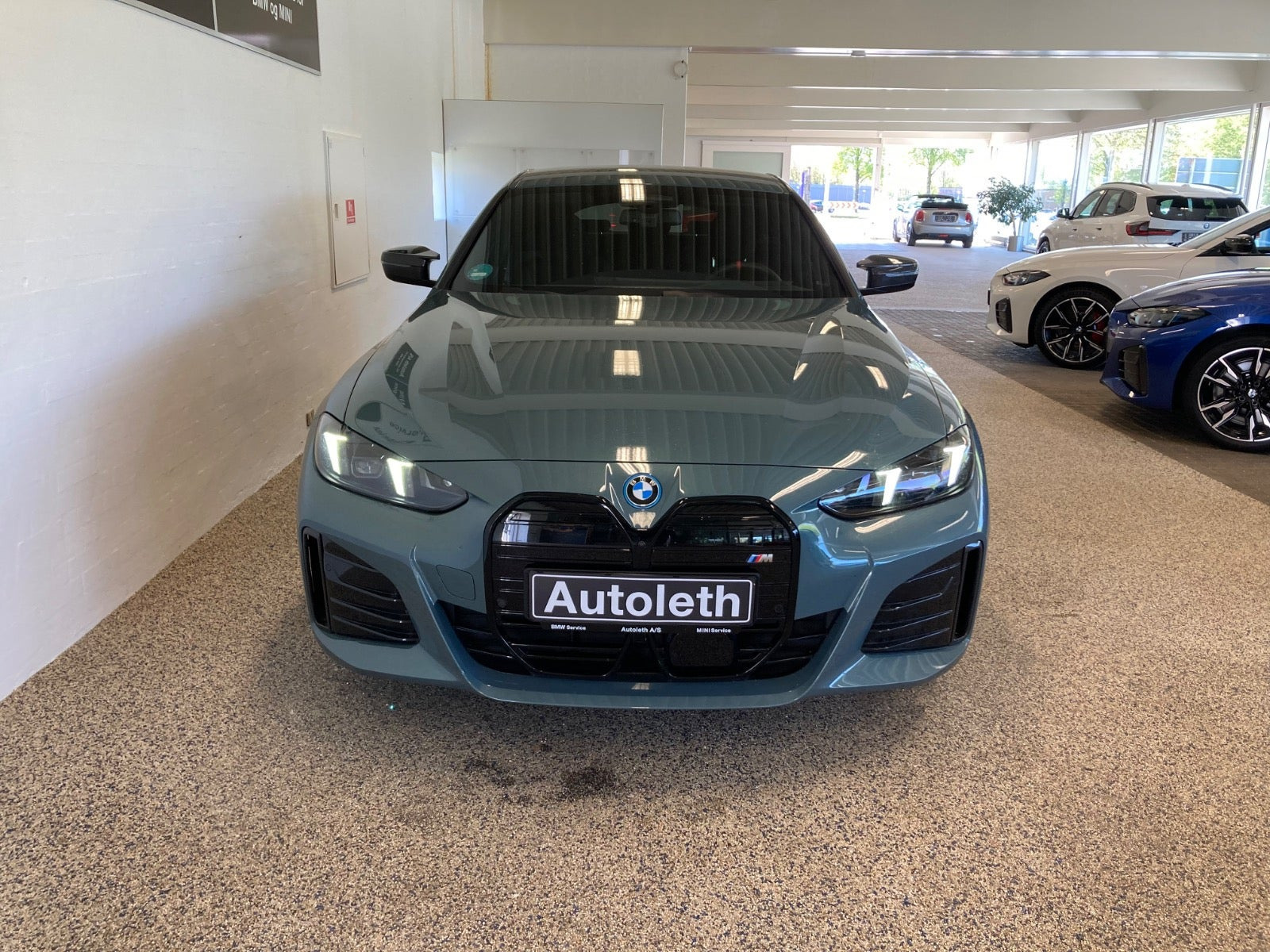 Grøn BMW i4 fra 2025