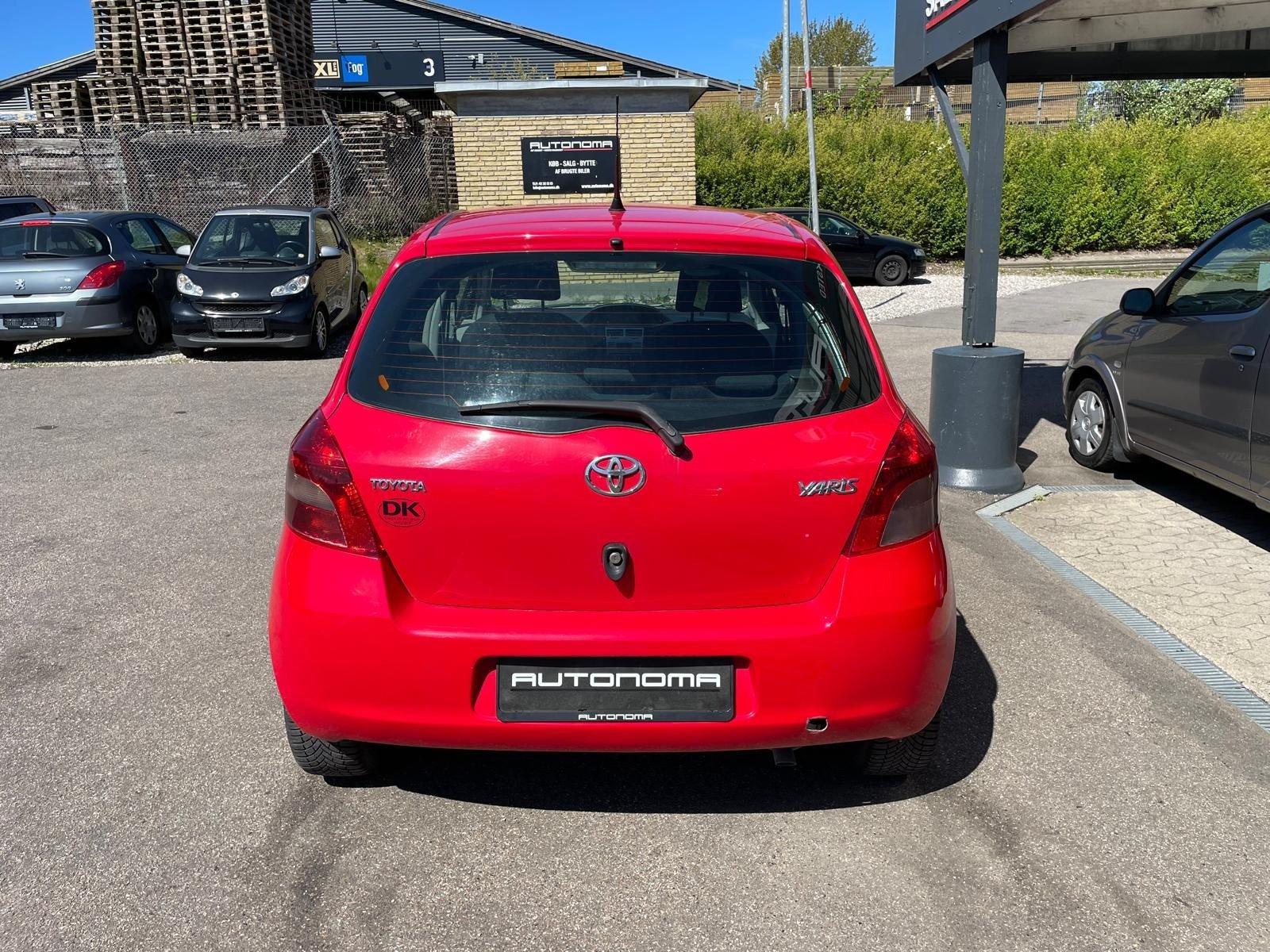 Rød Toyota Yaris fra 2009