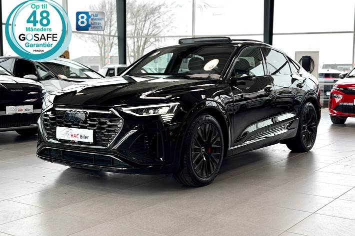 Gul Audi Q8 e-tron fra 2023 set udefra