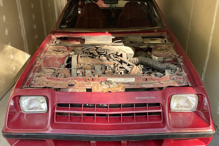 Rød Plymouth Anden fra 1983