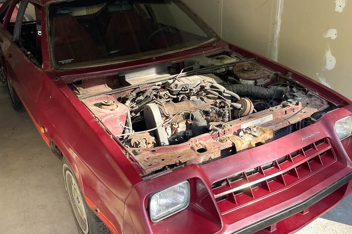 Rød Plymouth Anden fra 1983