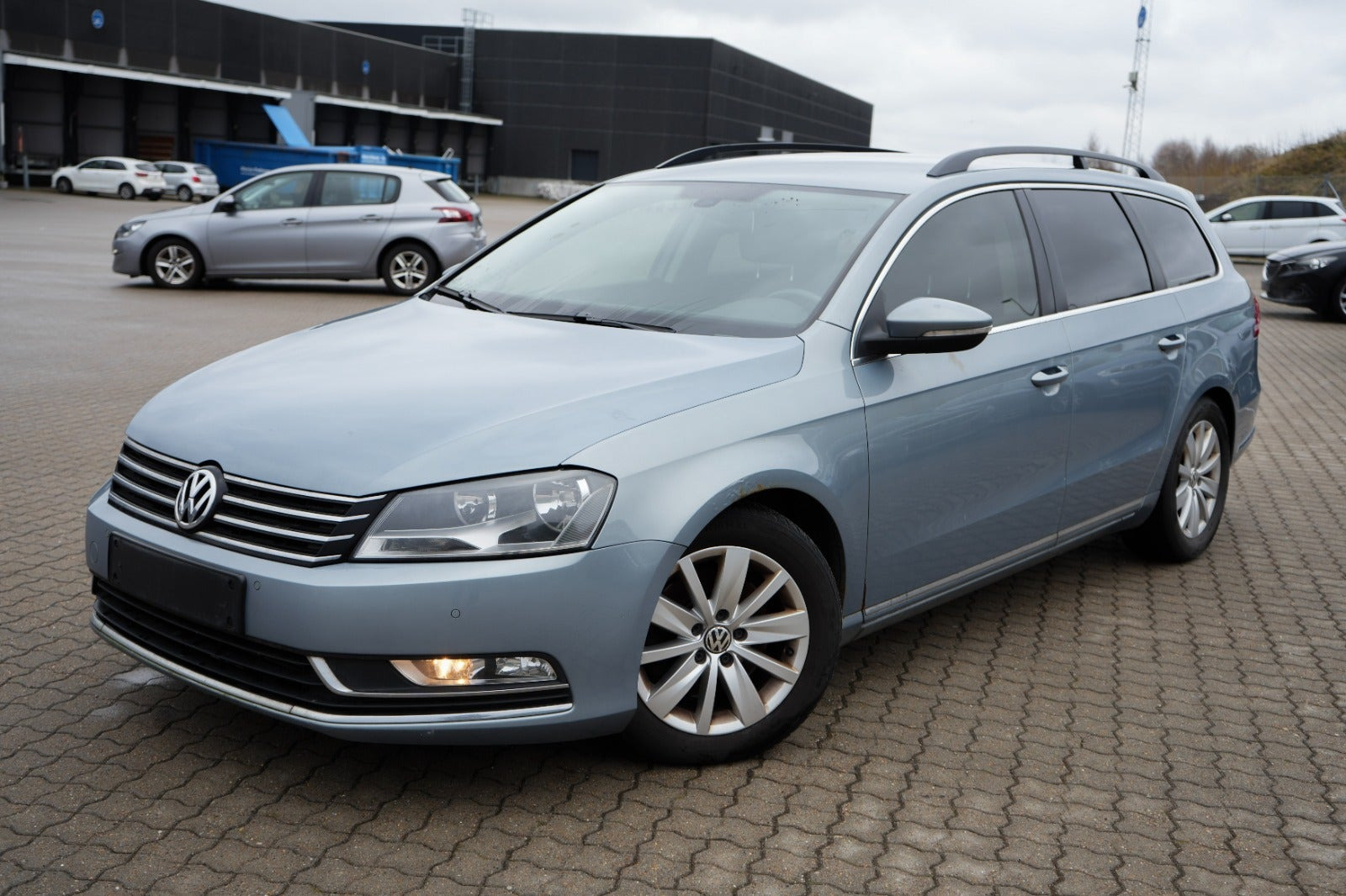 Blå VW Passat fra 2011