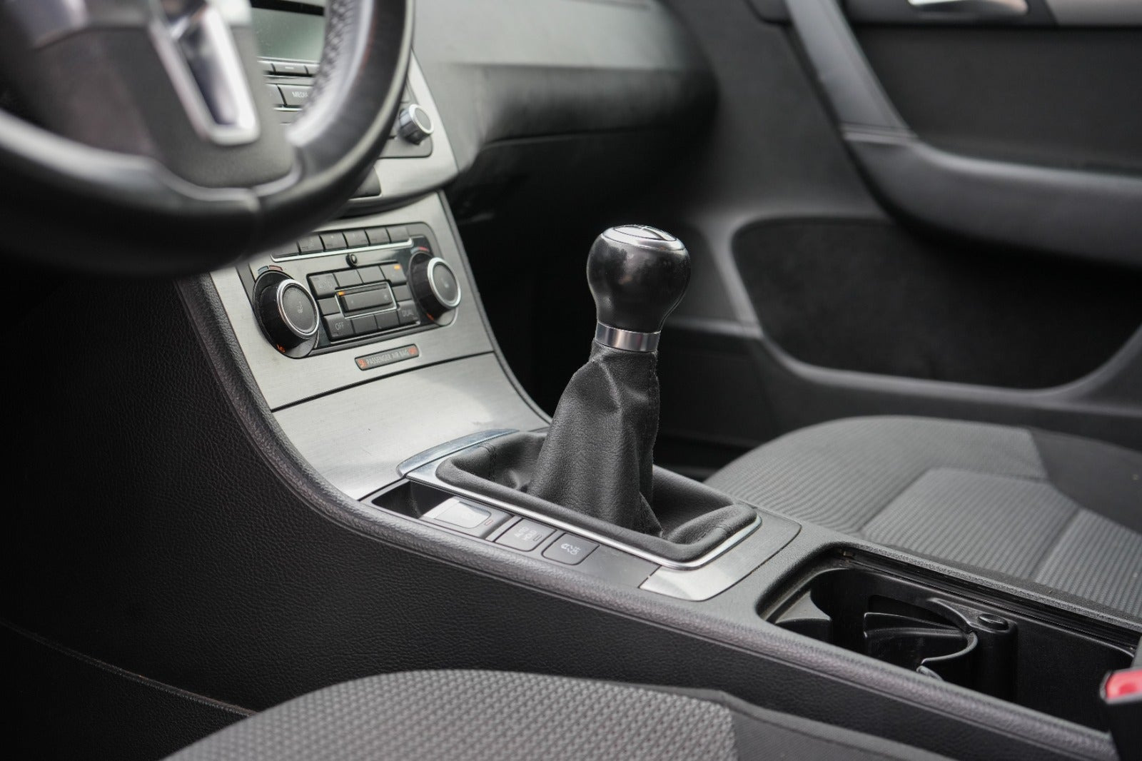 Blå VW Passat fra 2011