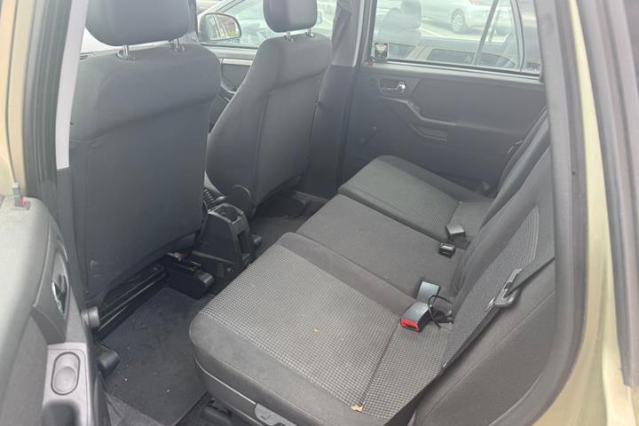 Orange Opel Meriva fra 2007