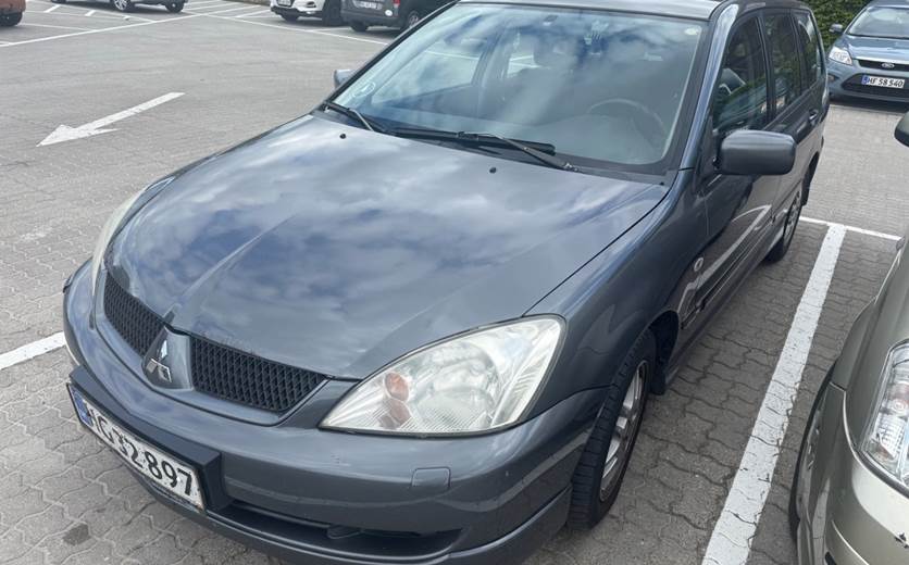 Mitsubishi Lancer 1,6 Comfort stc.