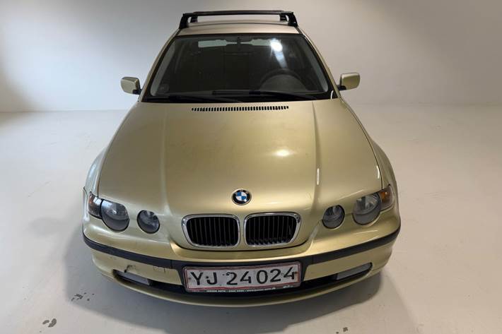 Gul BMW 316Ti fra 2002