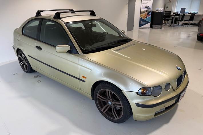 Gul BMW 316Ti fra 2002