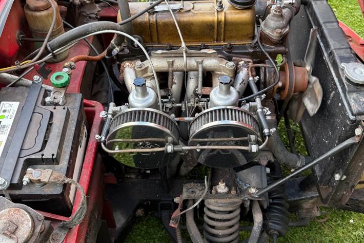 Rød Triumph Spitfire fra 1965