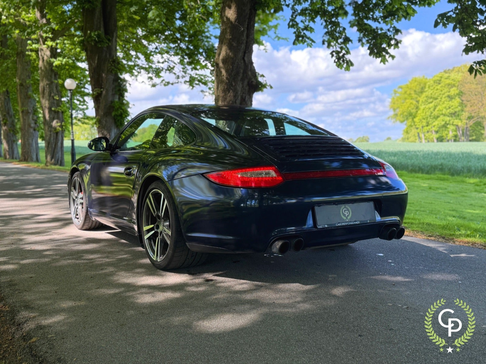 Sølv Porsche 911 Carrera 4S fra 2011