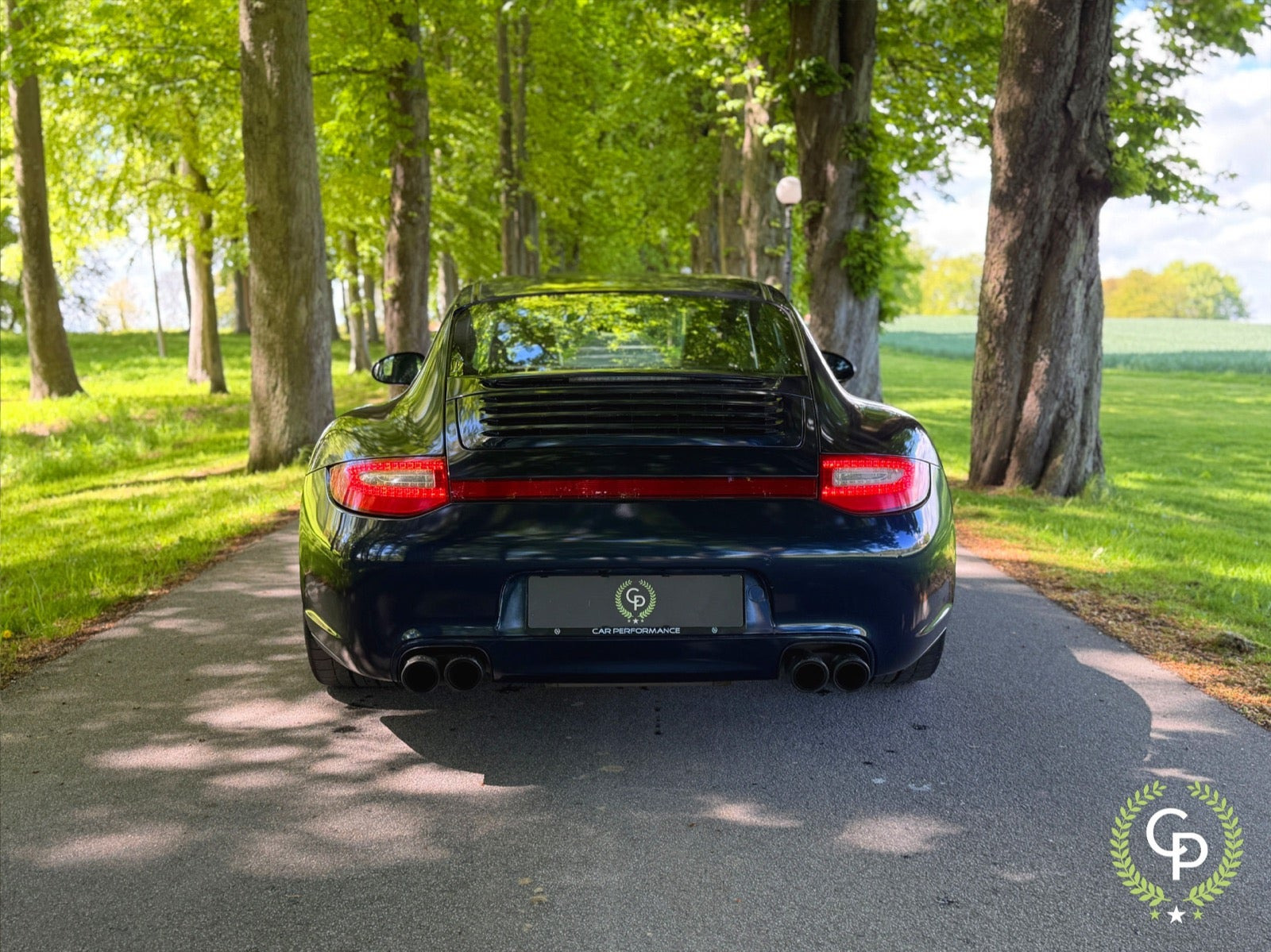 Sølv Porsche 911 Carrera 4S fra 2011