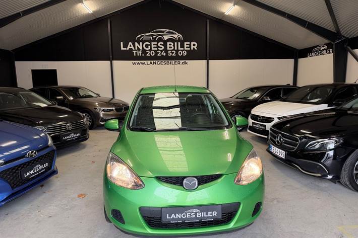 Grøn Mazda 2 fra 2009