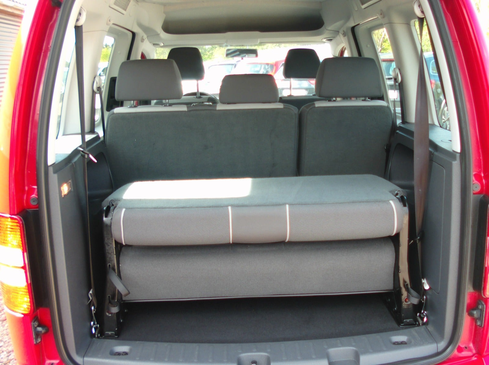 Rød VW Caddy fra 2011