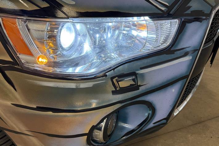 Brun Mitsubishi Outlander fra 2010