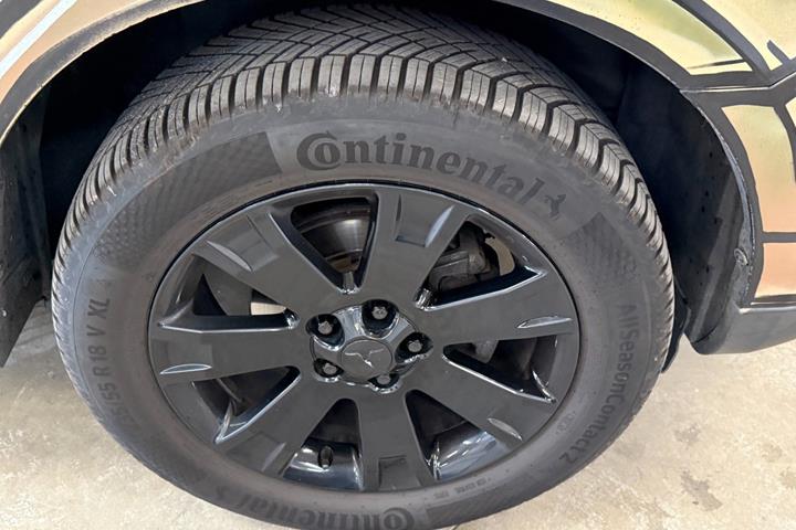 Brun Mitsubishi Outlander fra 2010 set udefra